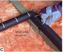 At corners, miter the insulation by making a 45-degree cut in the insulation tubing. Slip the insulation into place and butt the two edges together. Join with clips, adding an extra clip across the corner joint, as shown, so there are no gaps. For any valves wrap the pipe with insulation but leave the handle exposed.